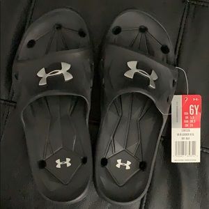 Youth Under Armor slide sandals, never worn.